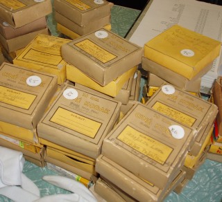 Boxes of home movies taken by Scobie and Claire McKinnon  Mooramong Colelction related image
