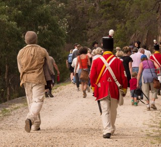 Convict King is escorted behind the visitors