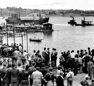 The launching of a US Lighter, built by Tulloch's at Brays Bay during the second world war