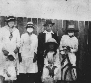 The Parker family of Lane Cove wearing gauze masks during the influenza epidemic of 1919