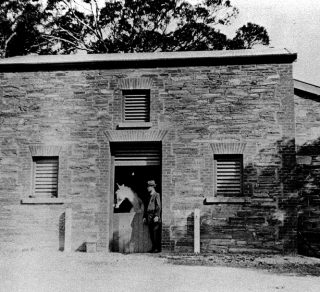 Police officer with his police horse called Envoy at the stables of the Willunga Police Station January 26th 1920 Nearby stands a woman and two young children Photograph b amp w 8 8 cm x 13 8 cm related image