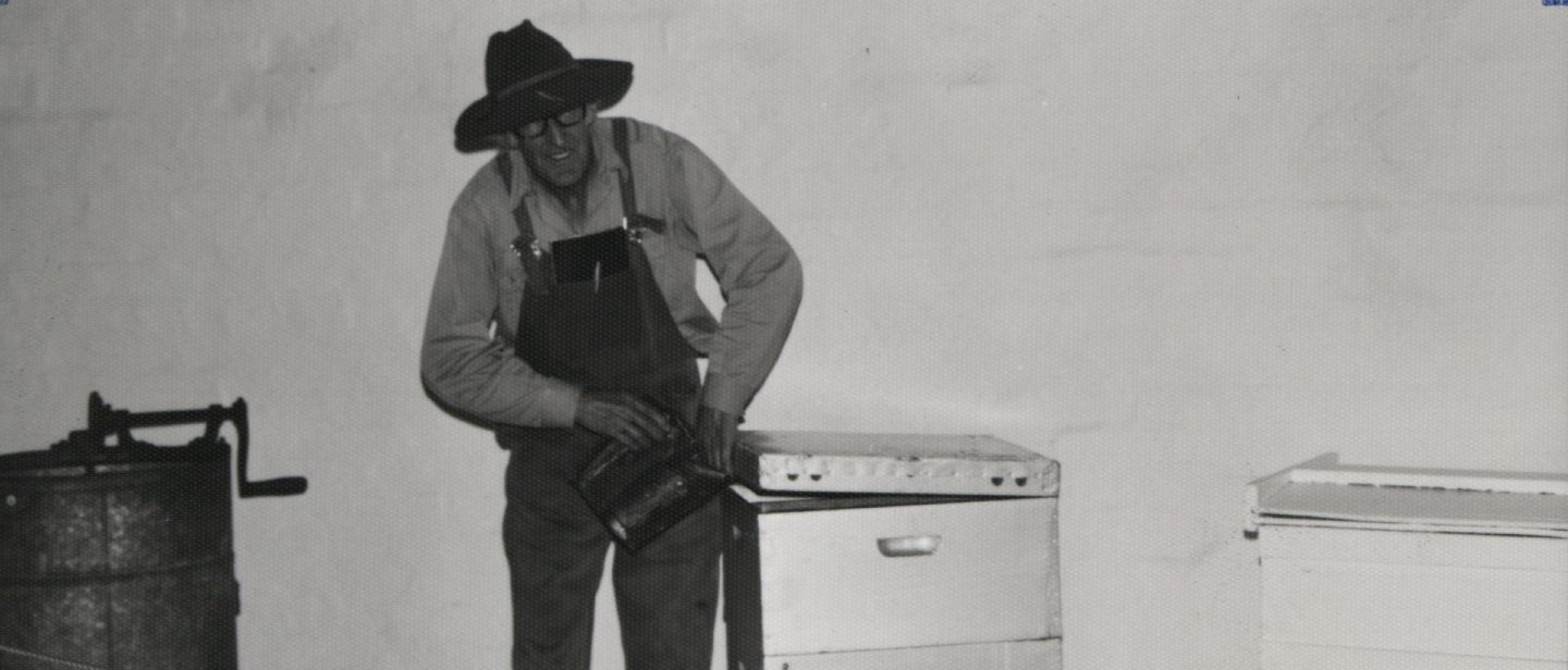 Sam Cook demonstrating his beekeeping equipment in an early Connor's Mill display (Toodyay Museums collection 2001.1267)