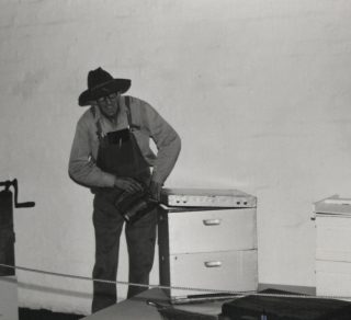 Sam Cook demonstrating his beekeeping equipment in an early Connor s Mill display Toodyay Museums collection 2001 1267 related image