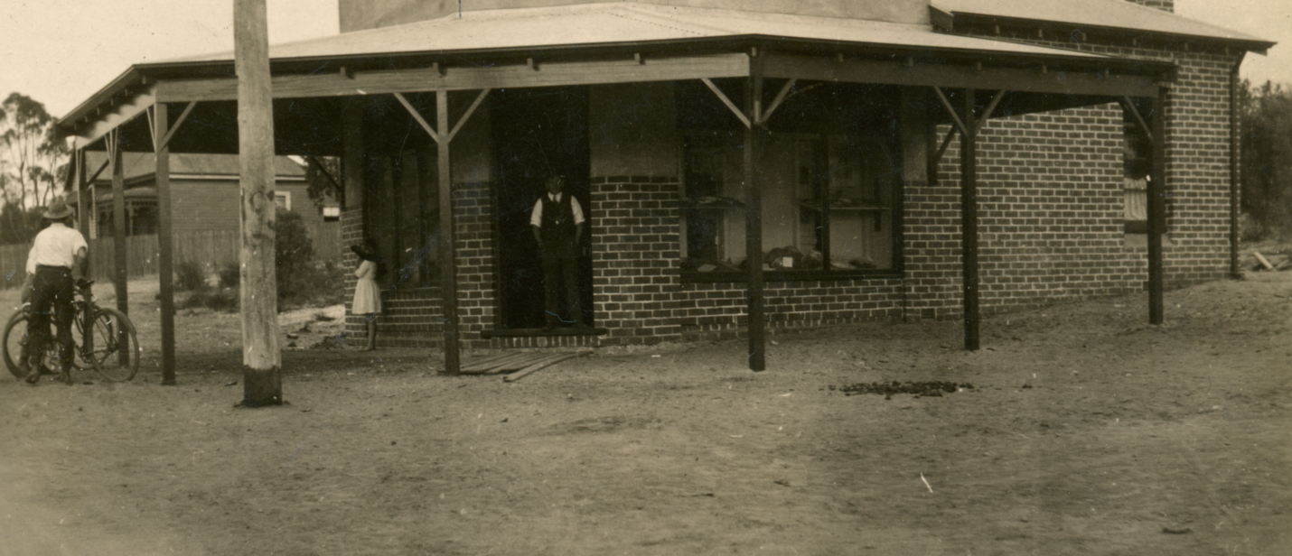 Winner- Helen Hall 2019 Local History Photographic Com - Wilson Family Shop with father Charlie Wilson cnr Gt Eastern Hwy and Norwood March 1922