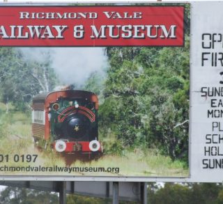 This large sign shows the dirt road entry to our area related image