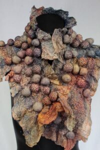 Wet Felted Merino creation, brown and purple and grey in colour with 3D felt balls all over