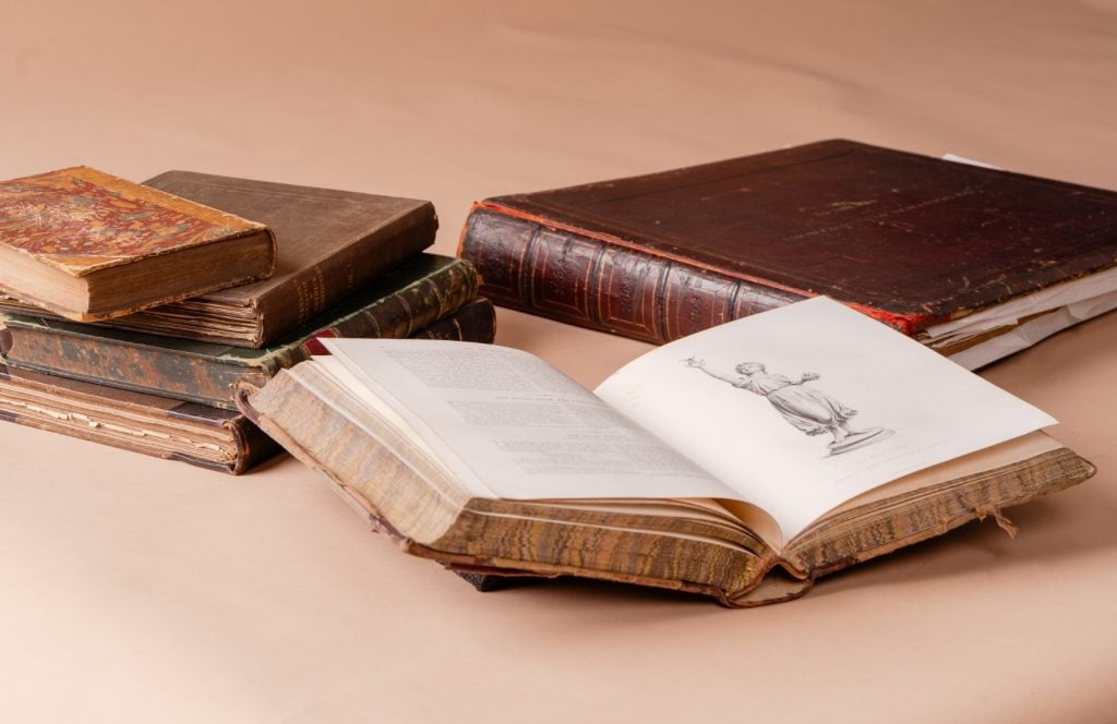 Antique leather-bound books.