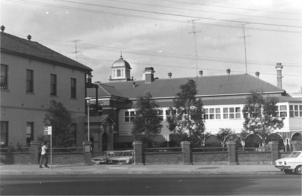 Black and white image of the former Maitland Hospital in the 1980s. (Photographed by David Sheedy)