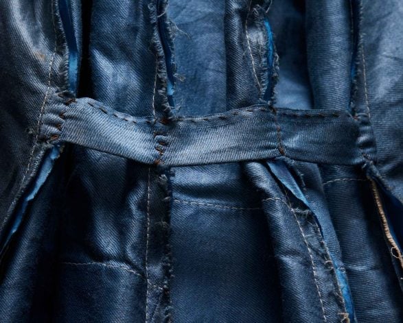 A blue jacket showing the seams