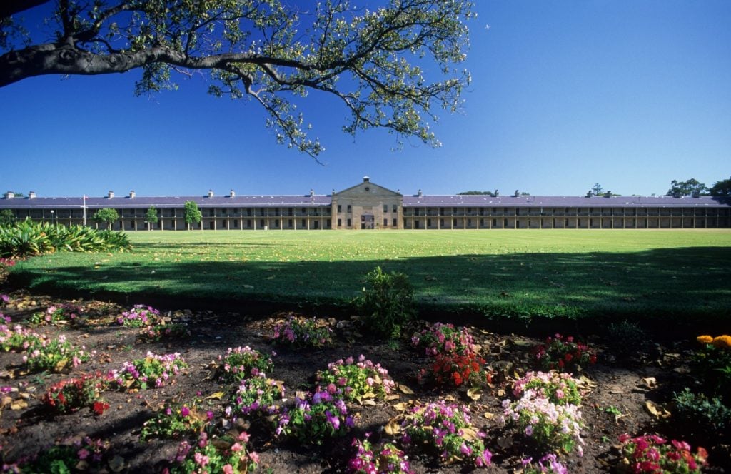Military building with a sweeping lawn.