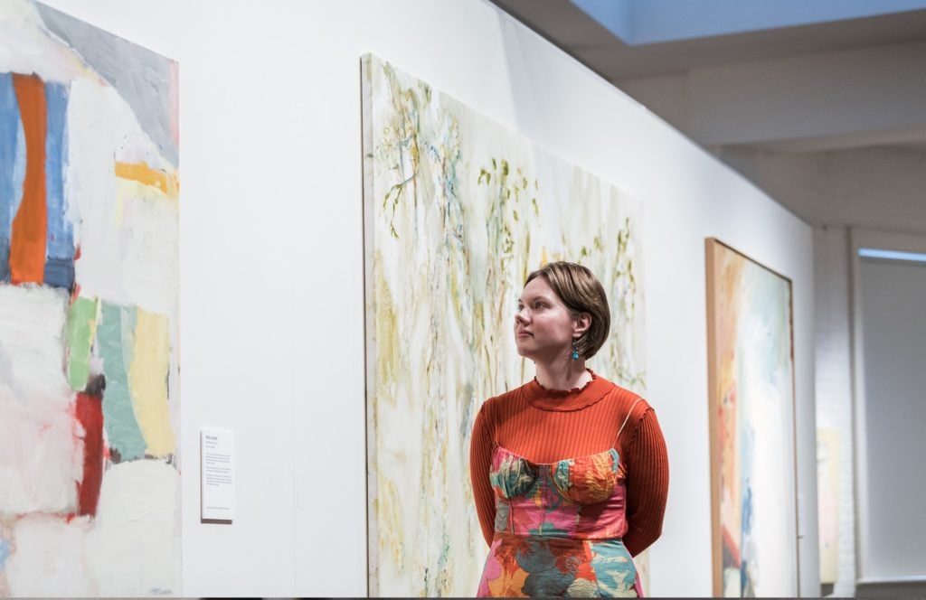 A visitor at S.H. Ervin Gallery.