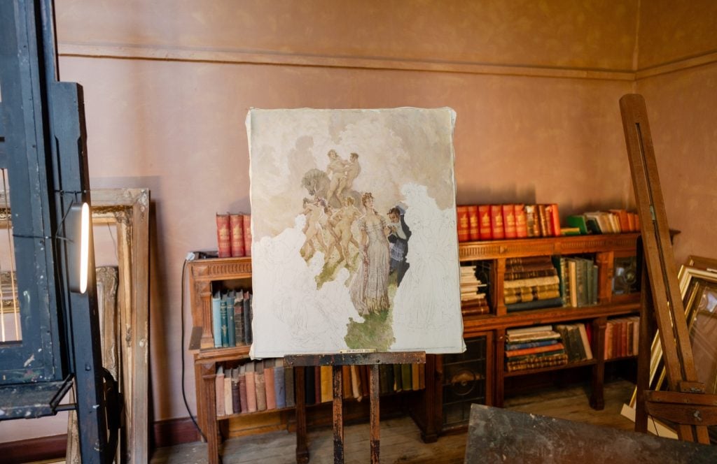 Norman Lindsay's studio featuring an unfinished work.