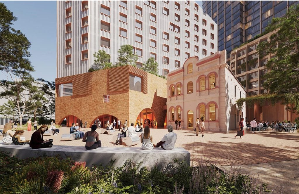 A generated image of a vibrant community square, featuring Wickham School of Arts surrounded by modern buildings.